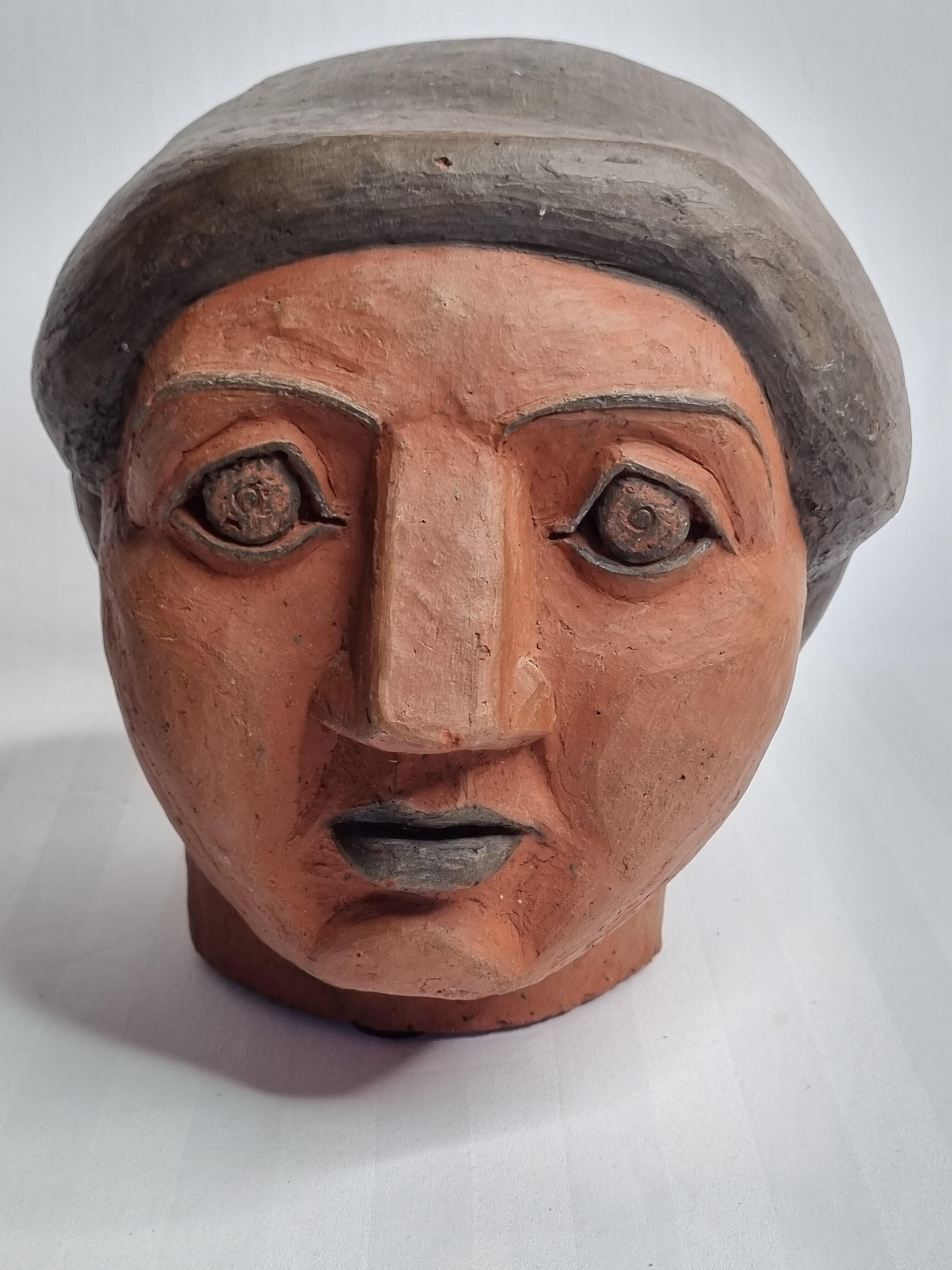 Set of 3 decorative women's heads in red terracotta
