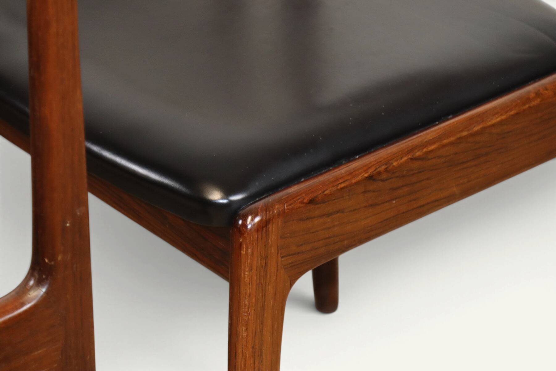 Set of 4 vintage teak and black faux leather chairs – 1960s