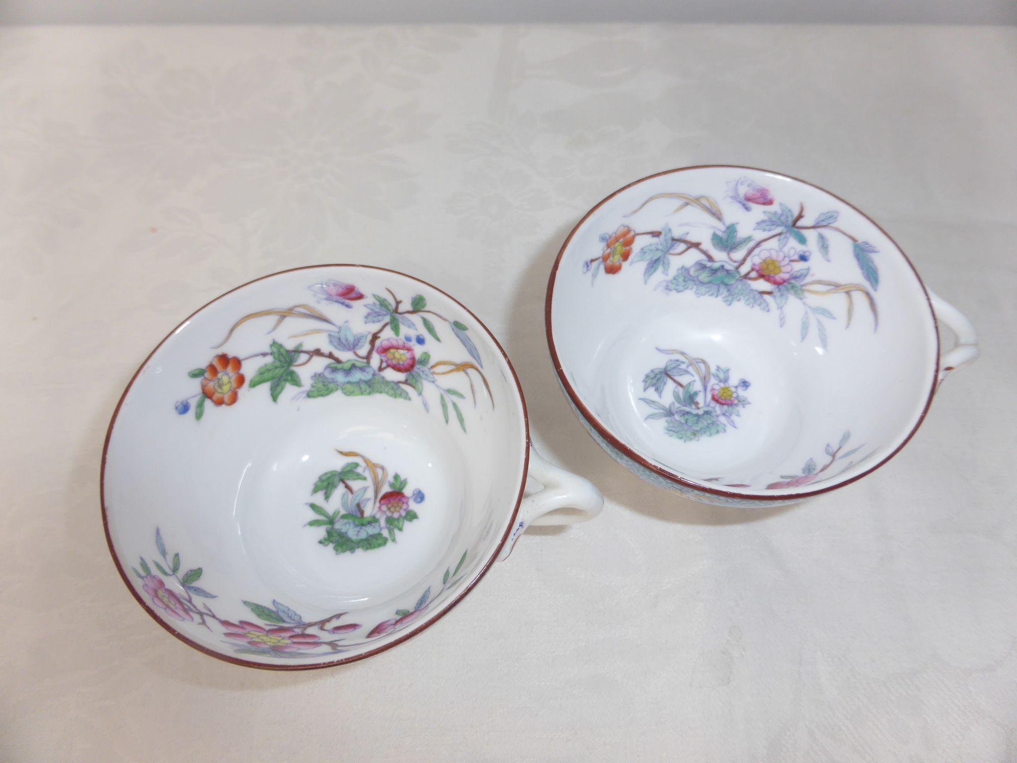 Pair of Rörstrand porcelain coffee cups with Japanese floral decoration