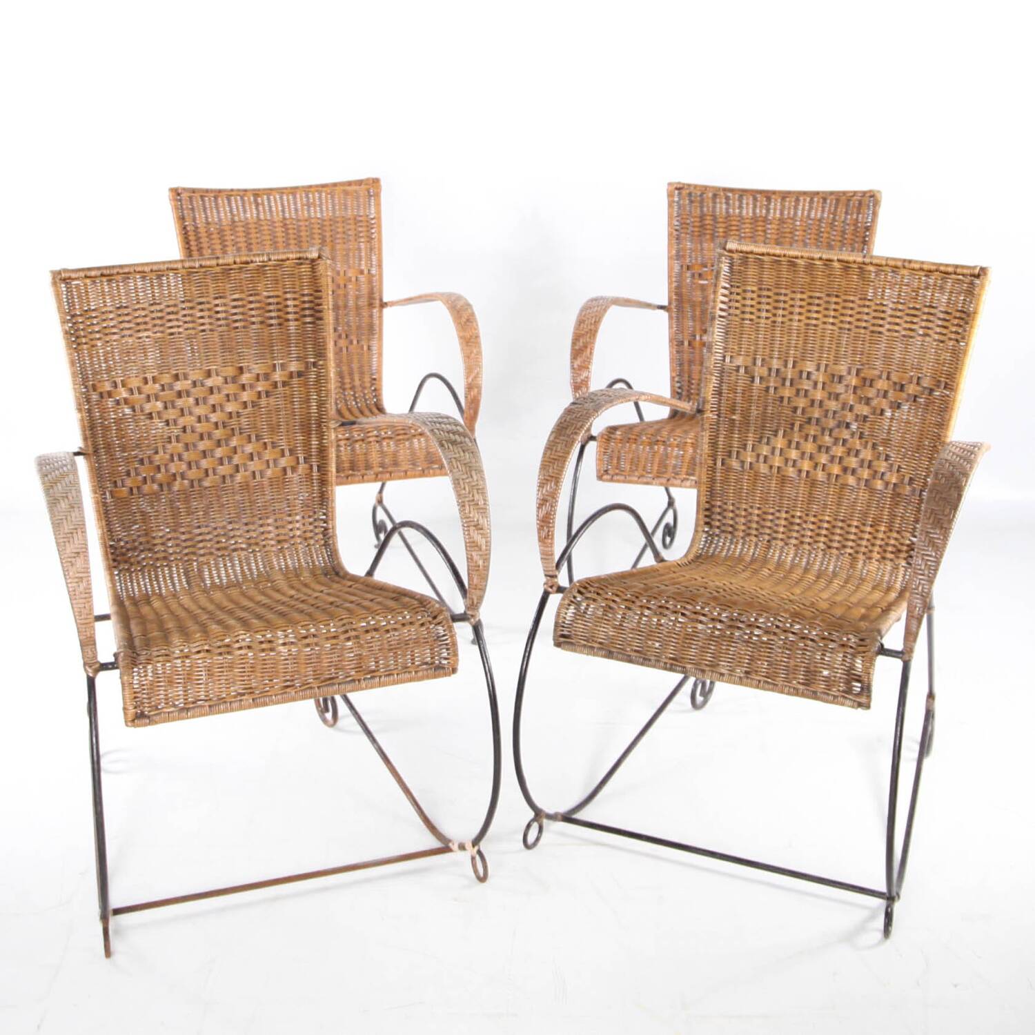Pair of rattan and iron armchairs