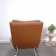 Vintage COR Swing armchair with ottoman, Reinhold Adolf, cognac leather
