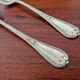 Christofle, Paris - Set of 2 table spoons - Crossed Ribbons model - in silver-plated metal