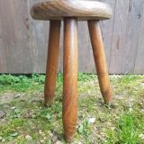 Old vintage wooden tripod milking stool