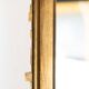Pair of large mirrors in gilded and patinated brass. Contemporary.