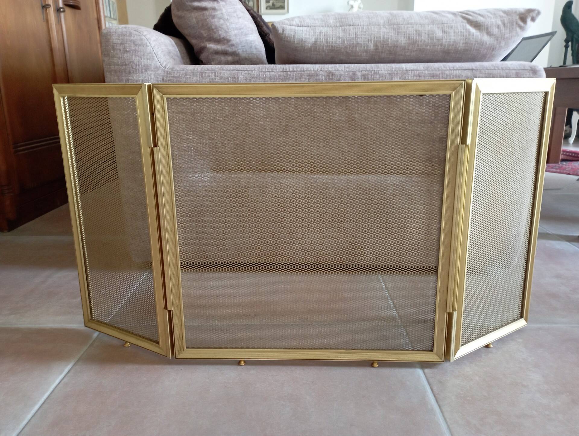 Gold metal fire screen