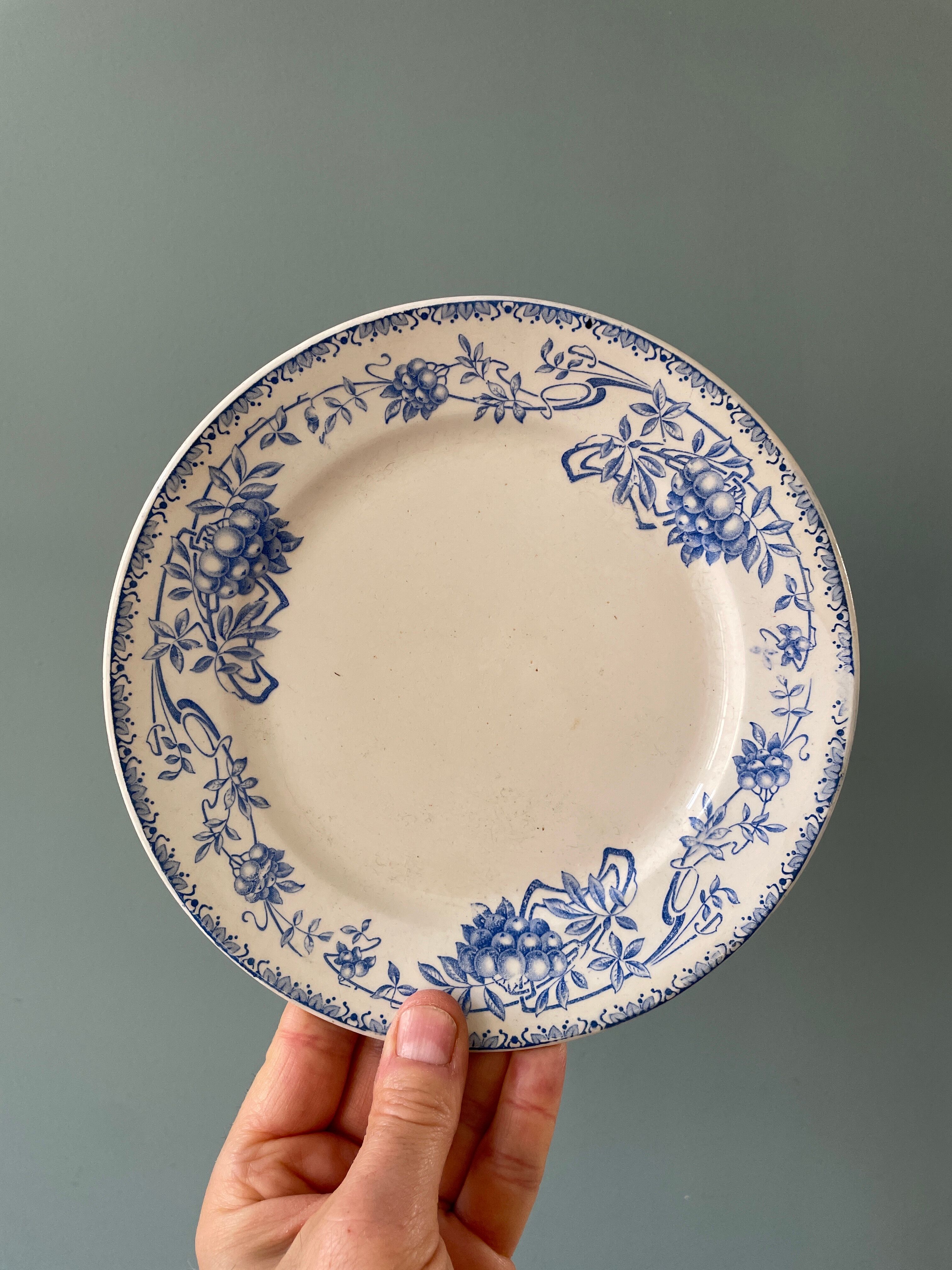 Series of 12 mismatched Terre de Fer dessert plates