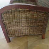 2 colonial-style armchairs in woven rattan and exotic wood