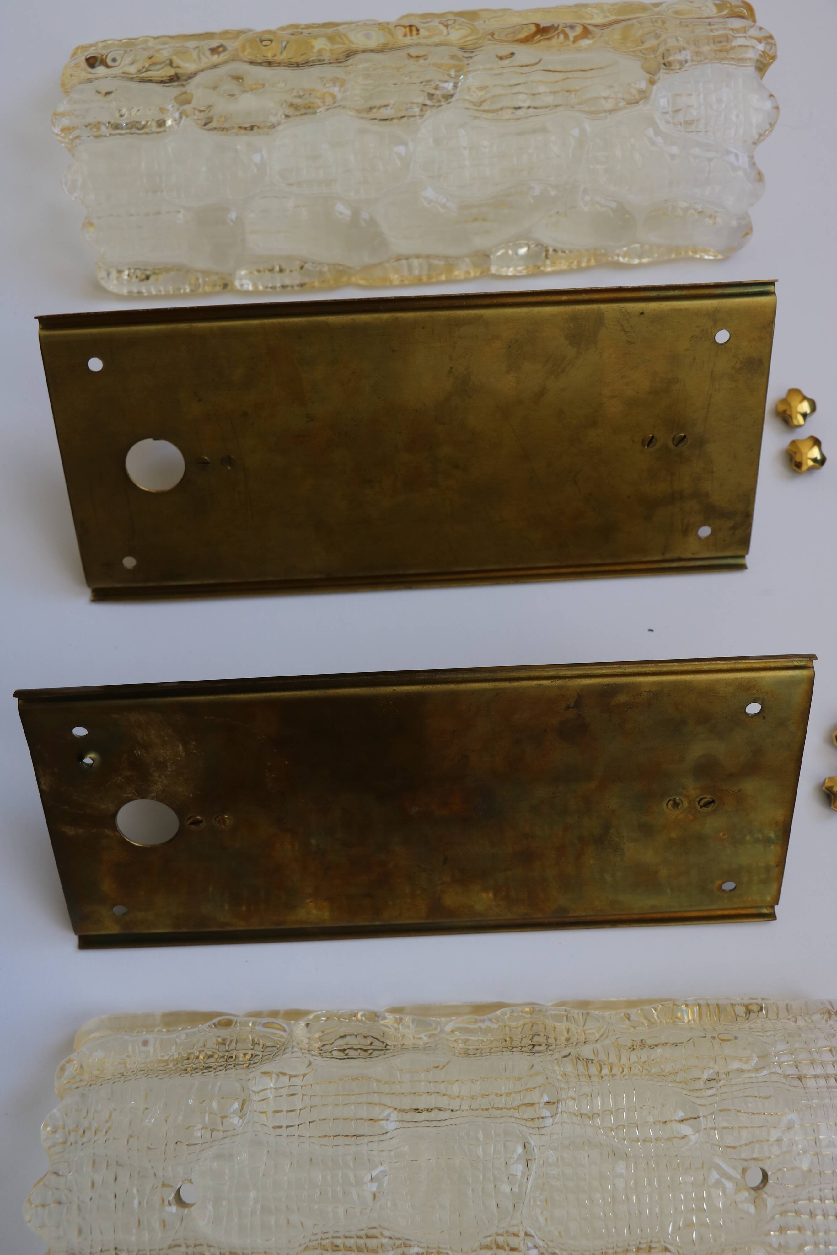 Pair of glass and brass wall lights by Carl Fagerlund for Orrefors, 1960.