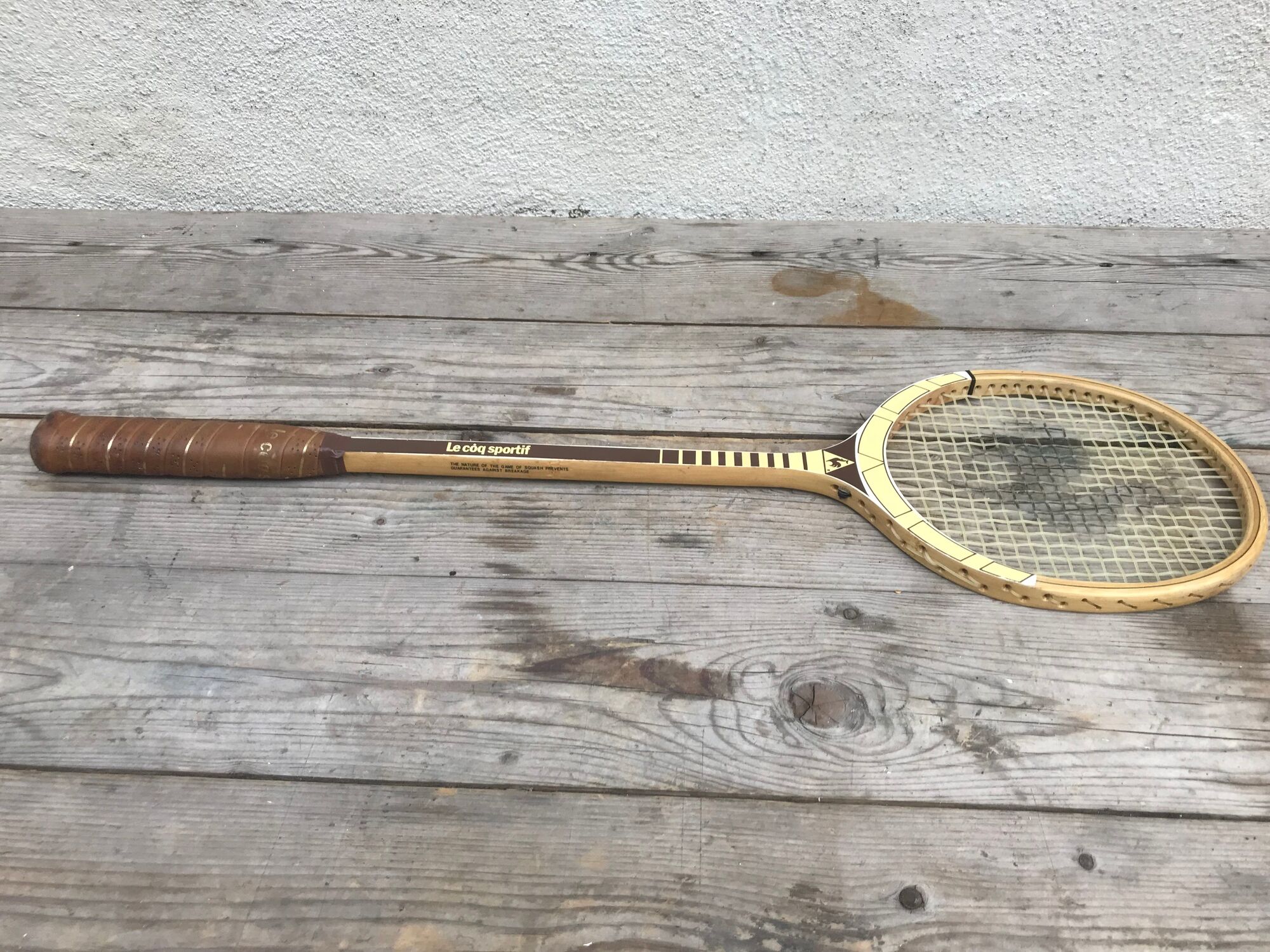 Raquette squash le coq sportif