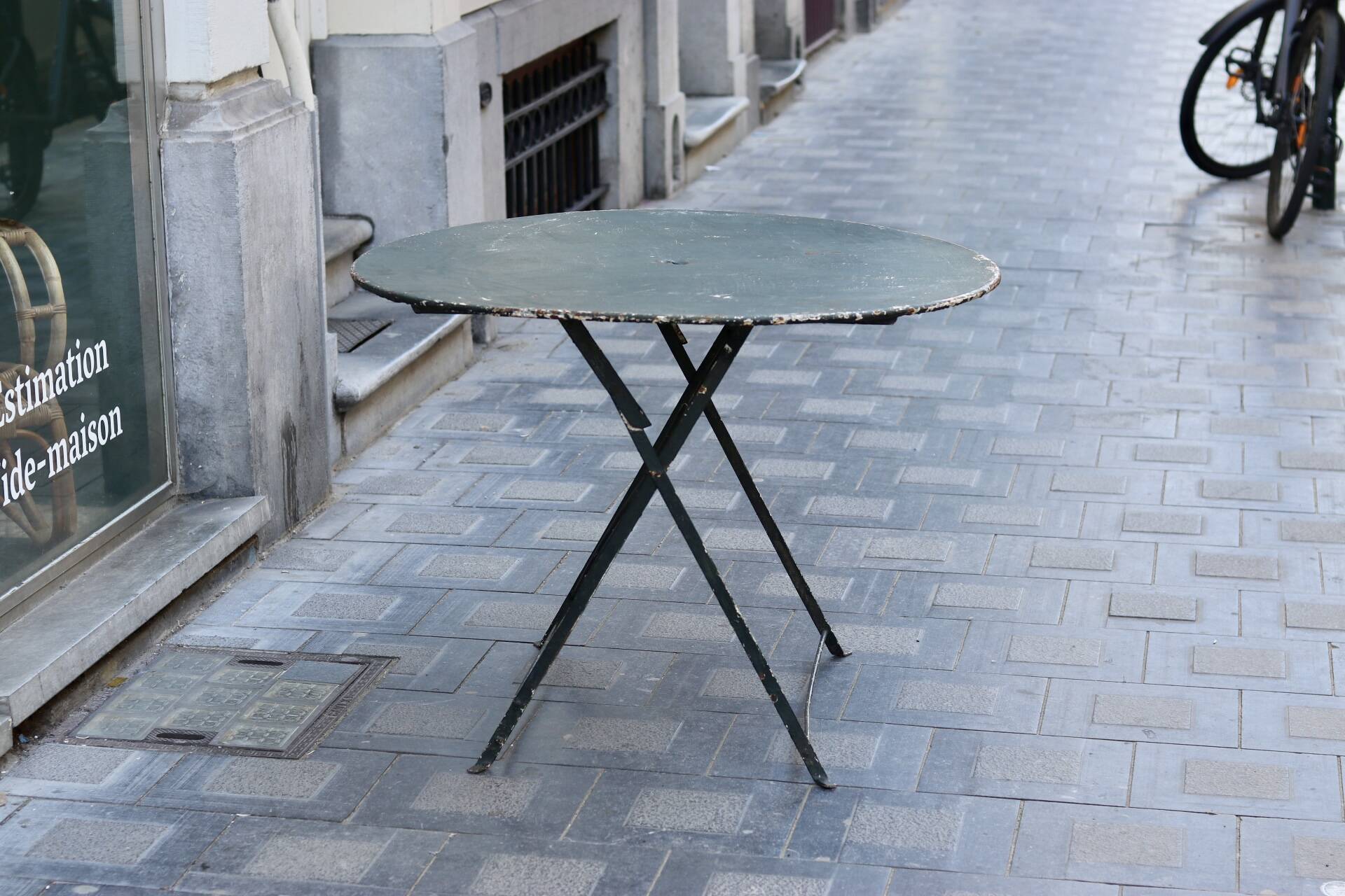 Folding wrought iron garden table