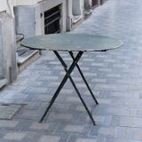 Folding wrought iron garden table