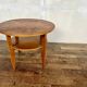 table basse ronde vintage en chêne clair