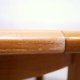 Vintage extendable round wooden dining table