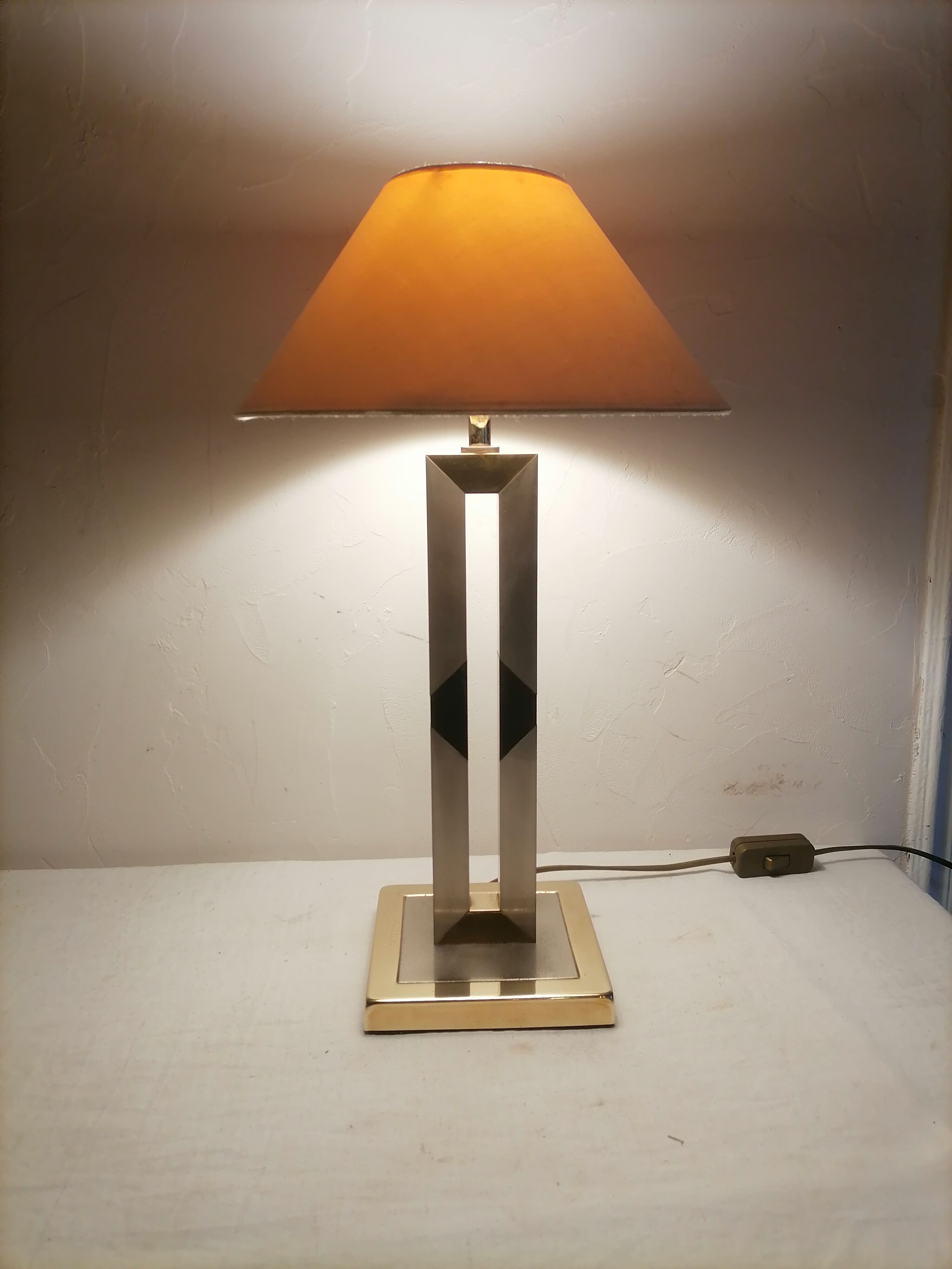 Modernist lamp. Brushed steel and brass.