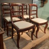 Série de 4 chaises à barettes en acajou