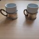 2 porcelain coffee cups with cup holder and metal tray
