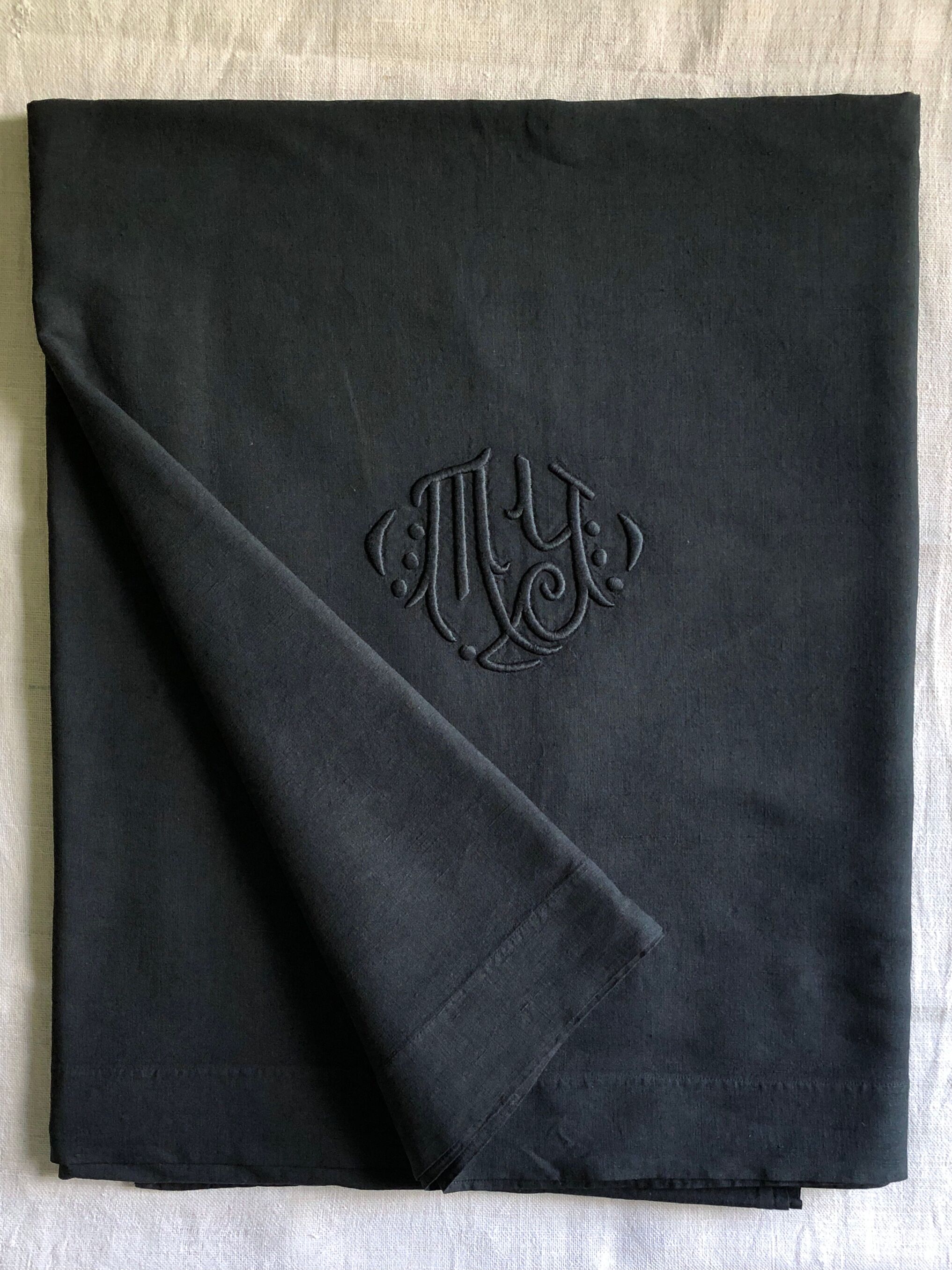 Old sheet in pure washed linen tinted in charcoal black