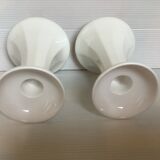 Pair of white candlesticks with faceted tulip foot