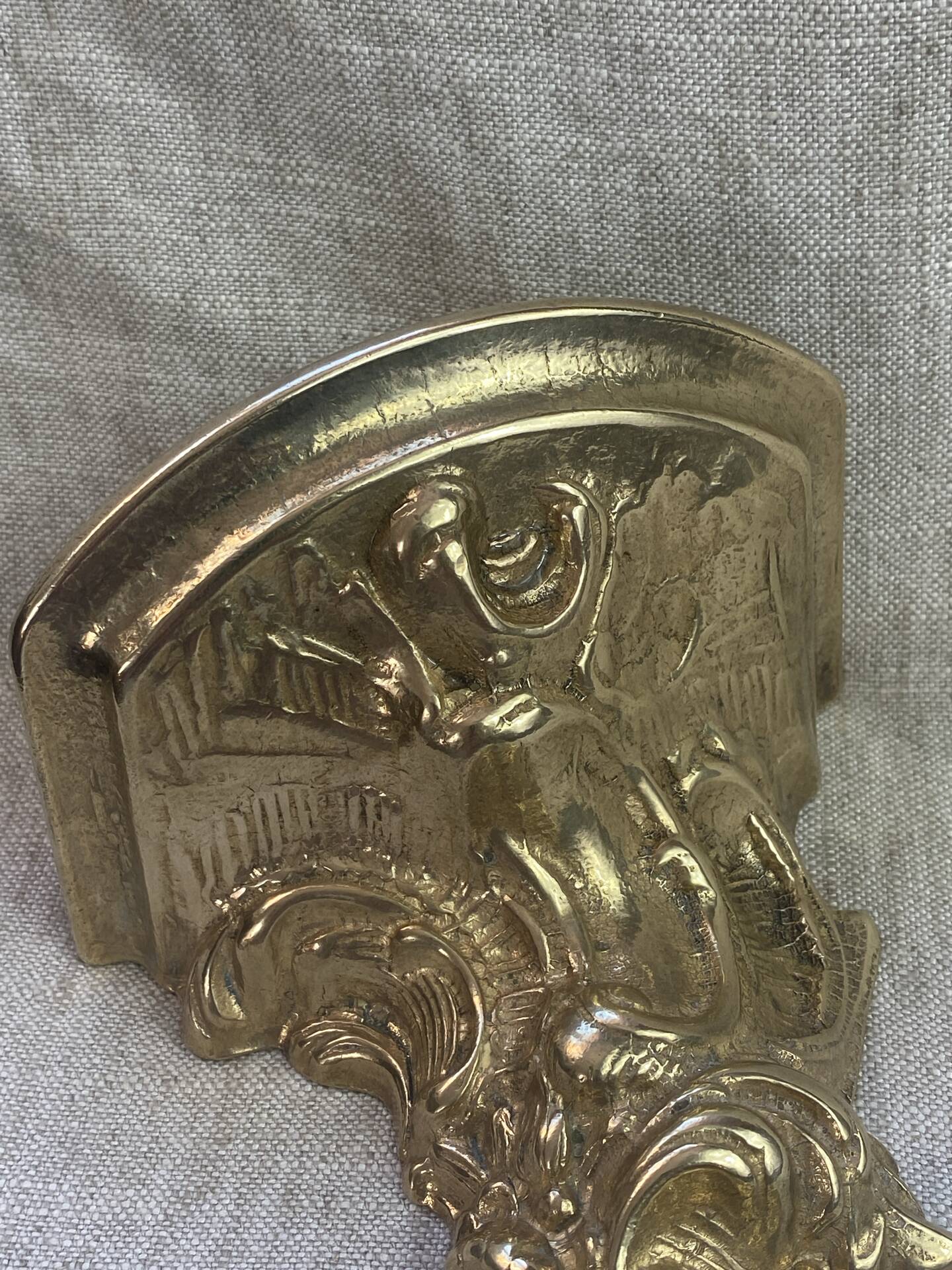 Small wall console in Rococo style in bronze