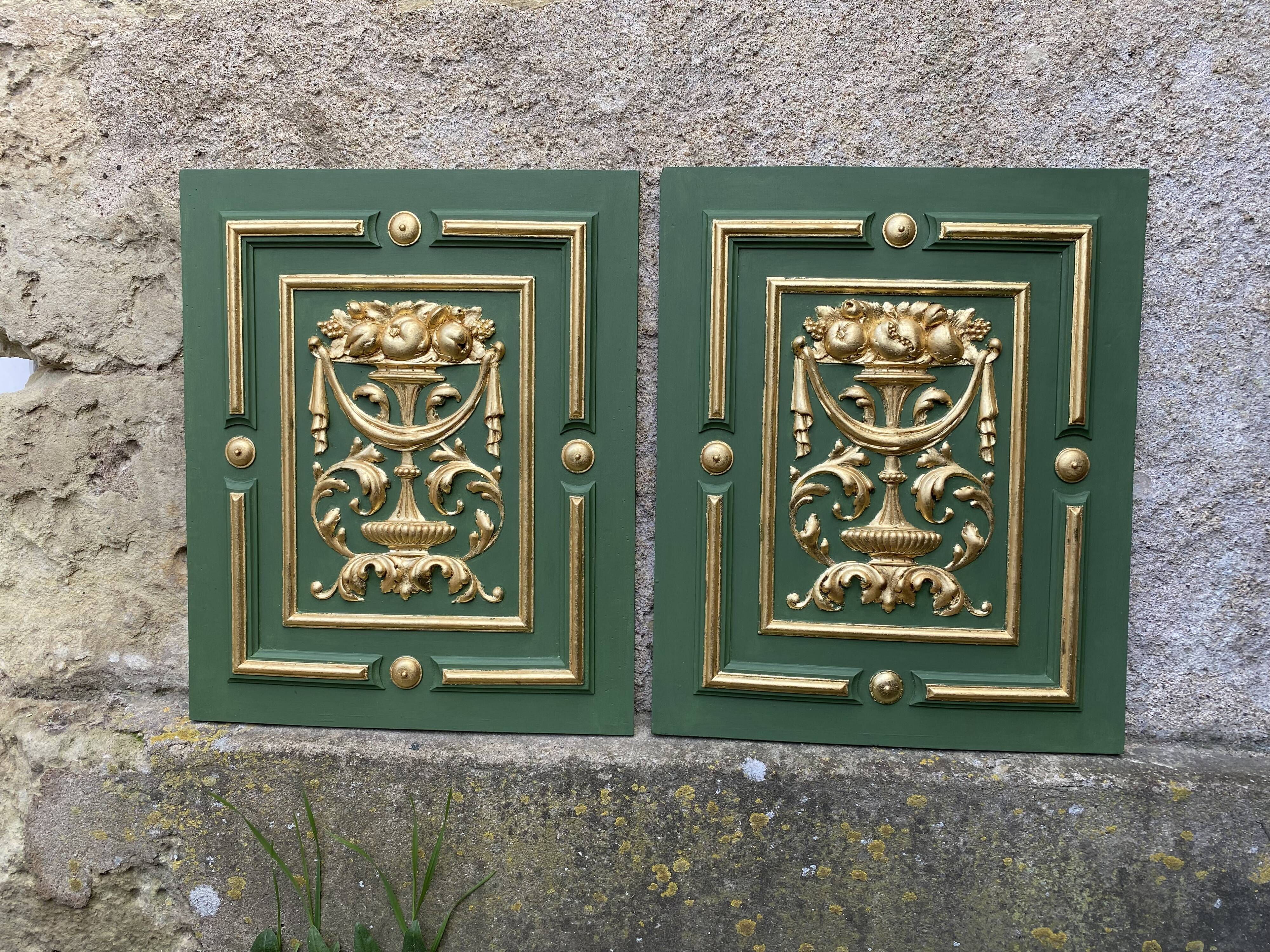Pair of carved and leaf-gilded wooden panels