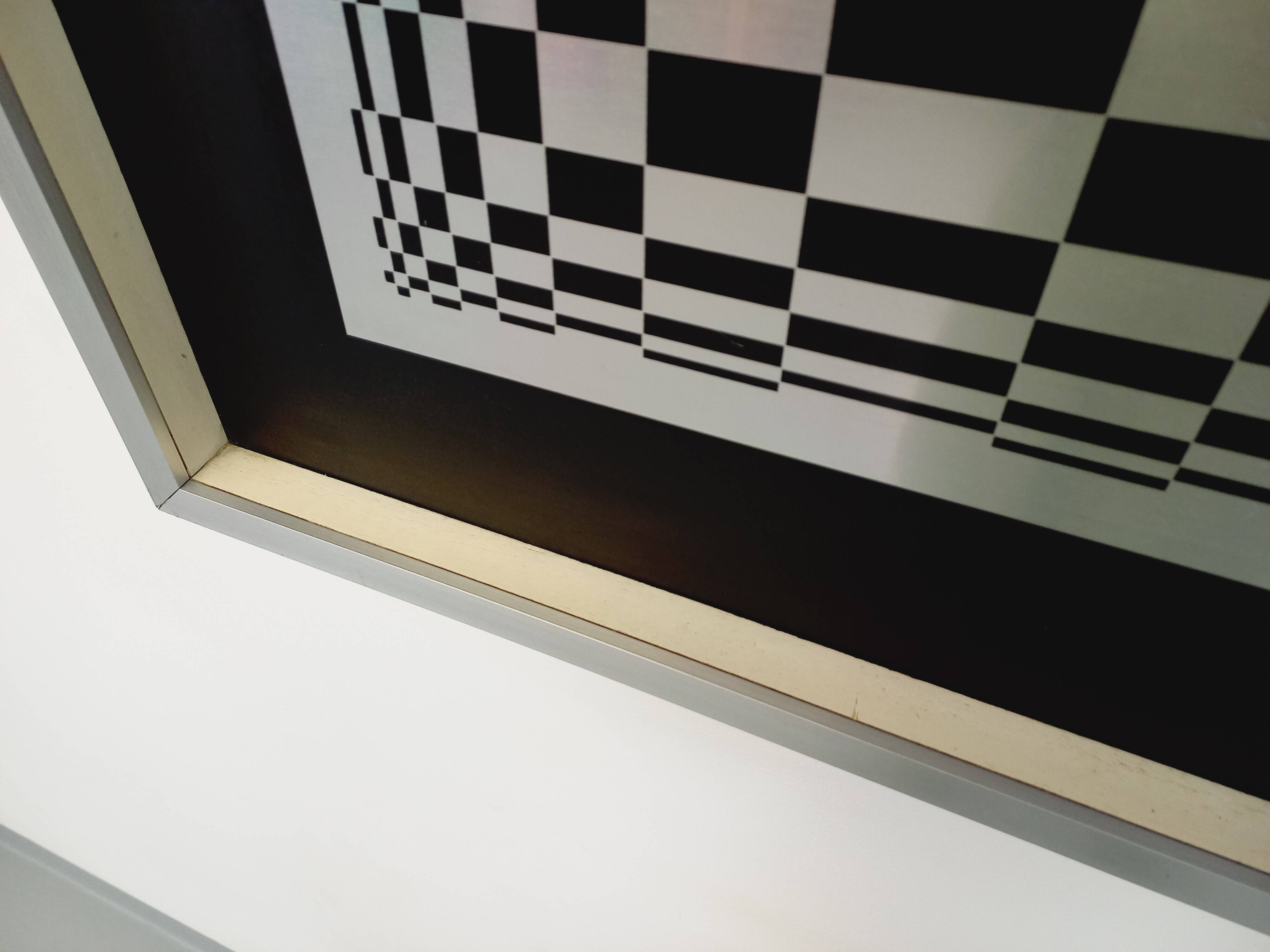 Typical silkscreen painting in kinetic checkerboard on aluminum, Italian abstract design in Vasarely style