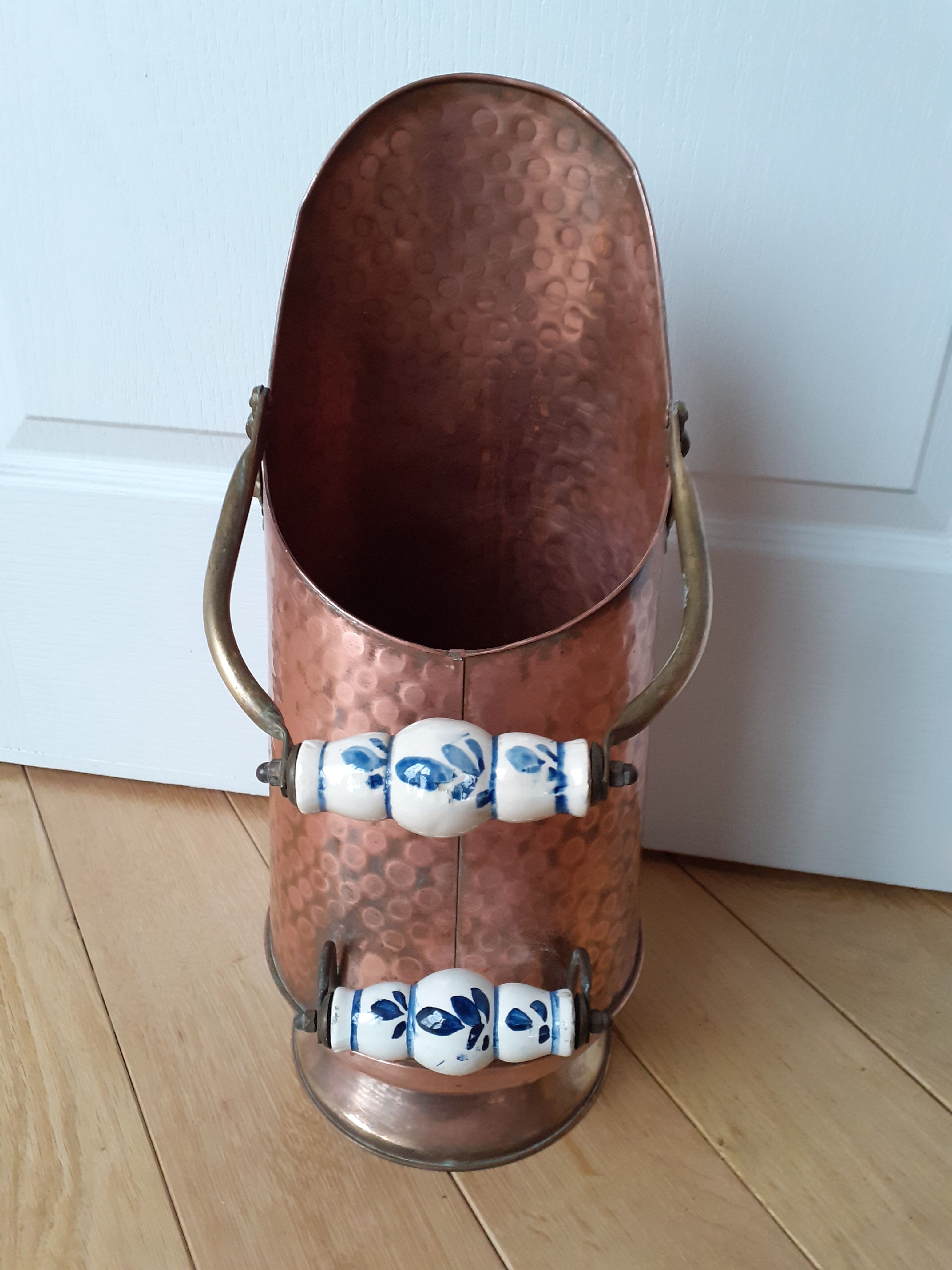 Old coal bucket made of copper and brass