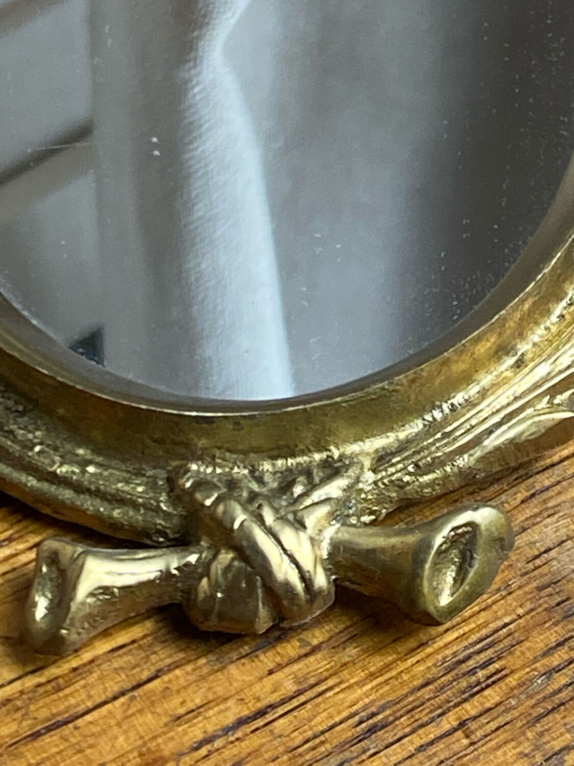 Small antique bronze mirror