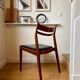 Chaise scandinave en teck et skaï noir