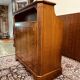 Antique English Chesterfield mahogany bar with bar stools