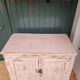 Antique low sideboard with powder pink patina – waxed solid wood