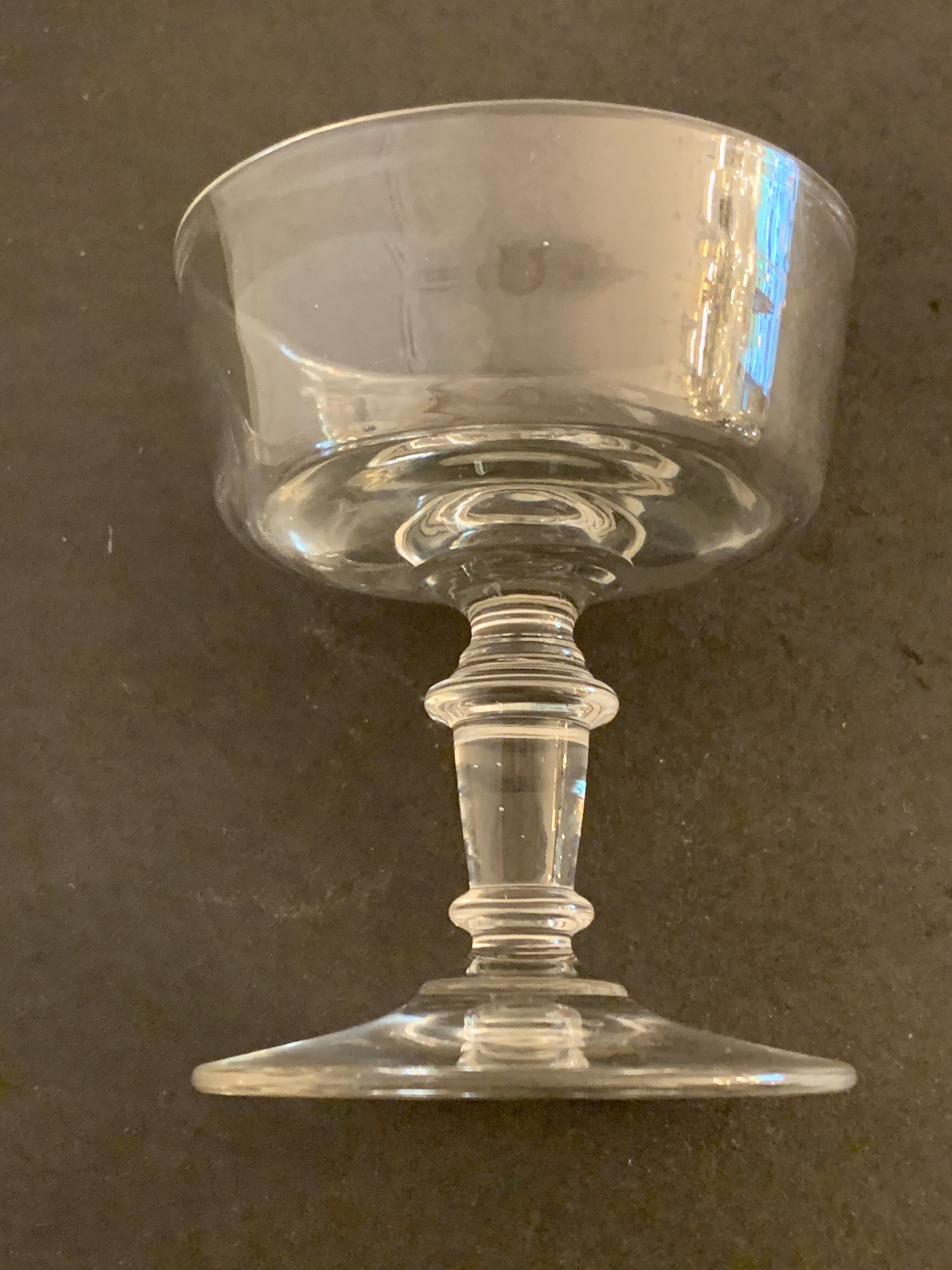 3 old champagne cups in blown and bubbled glass