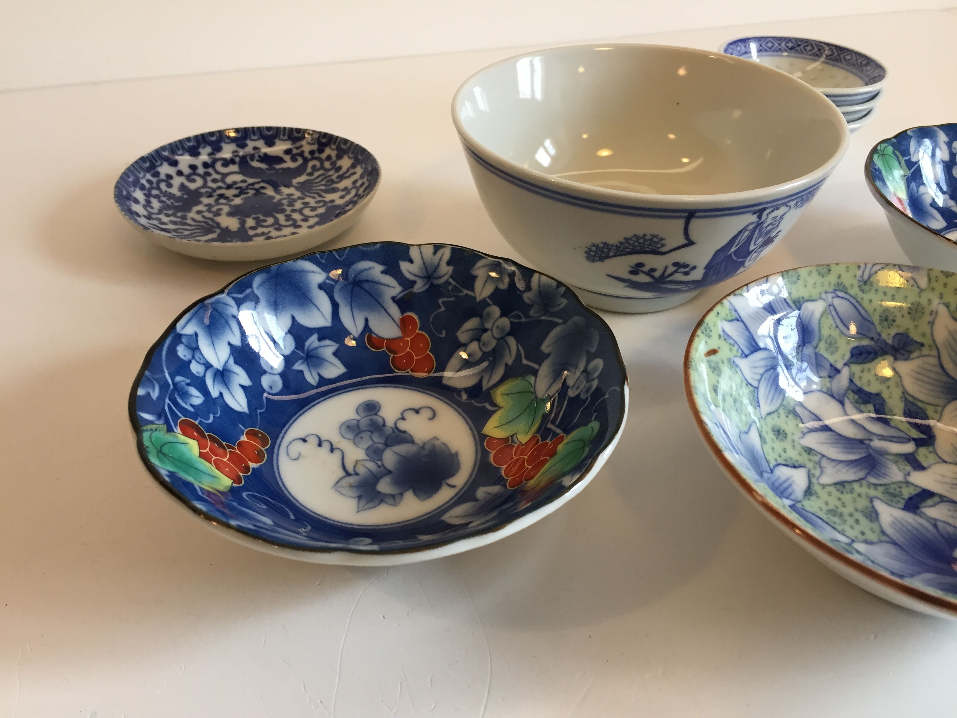 set of 4 bowls and 4 asian porcelain cups