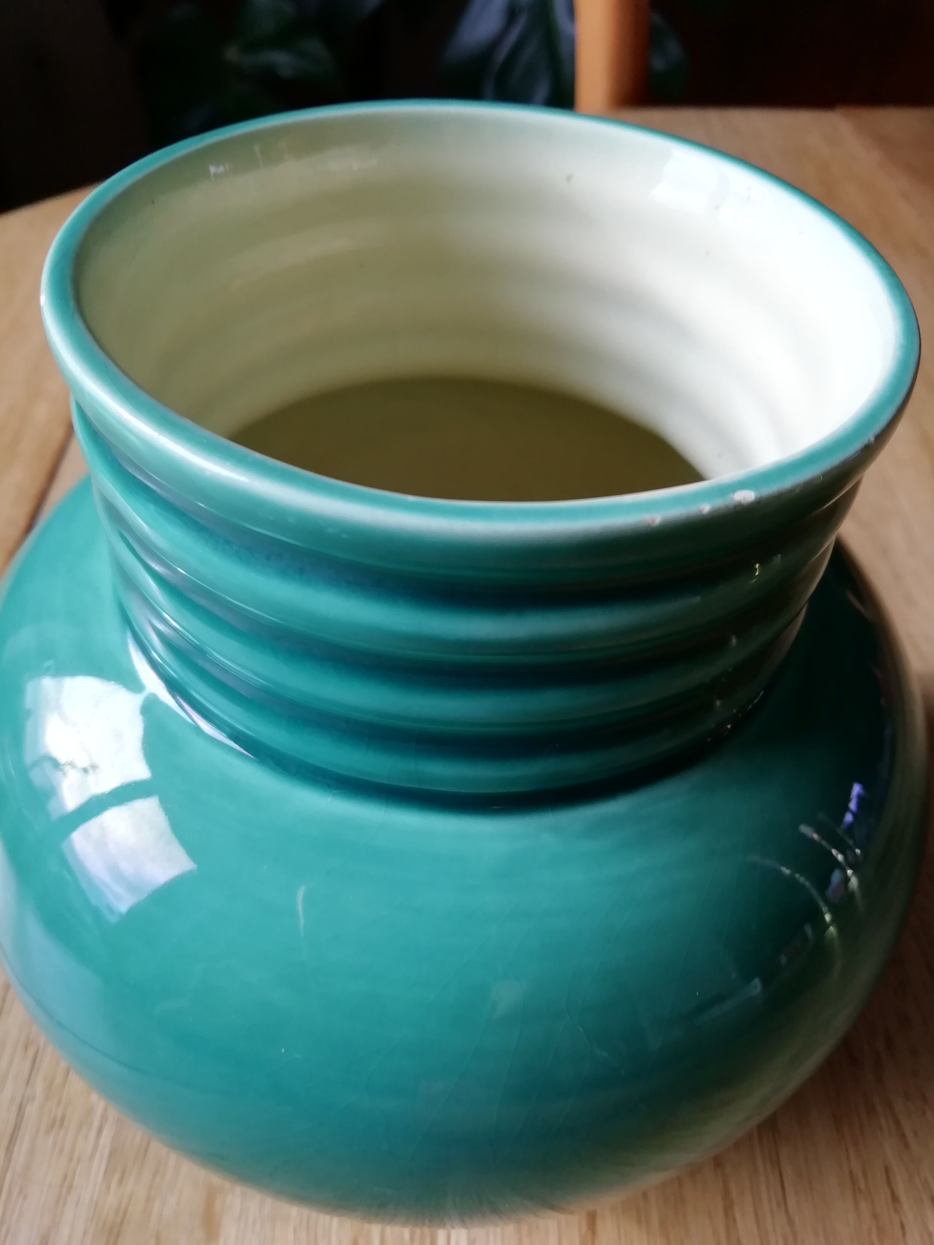 Emerald green ball vase