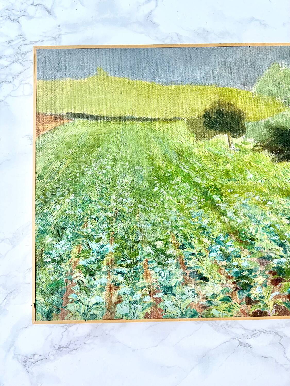 Oil on canvas countryside landscape under a stormy sky