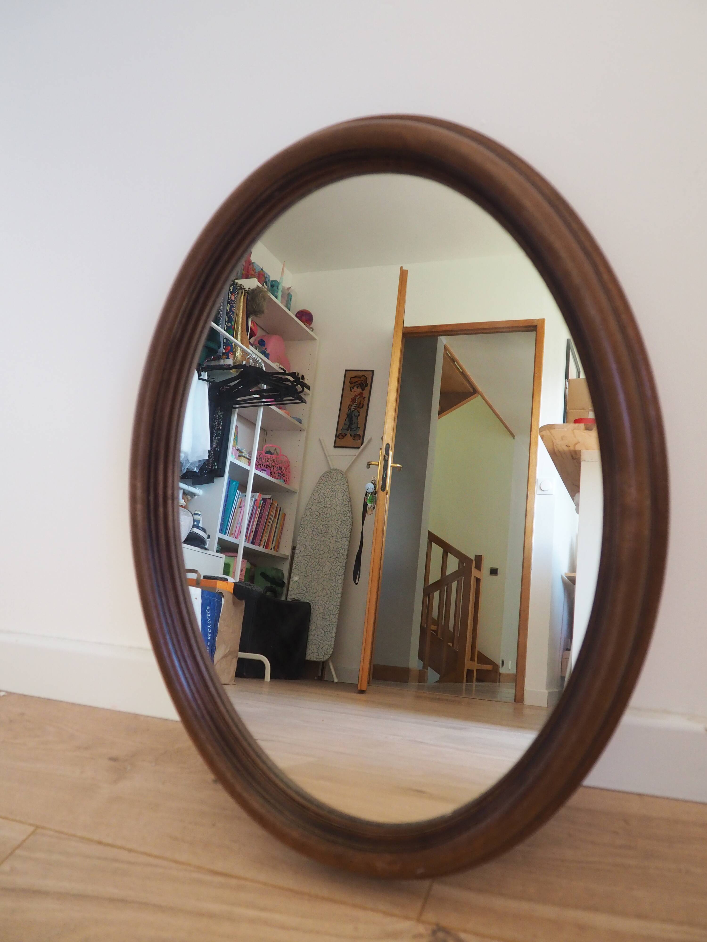 Vintage oval mirror with wooden frame
