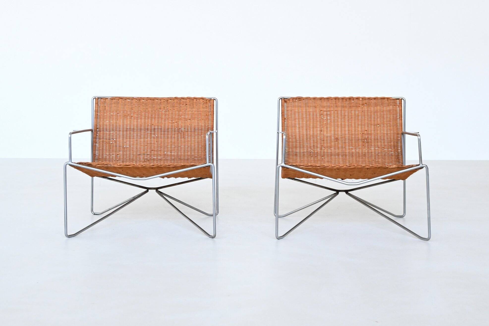 Pair of lounge chairs steel and rattan Gelderland The Netherlands 1964