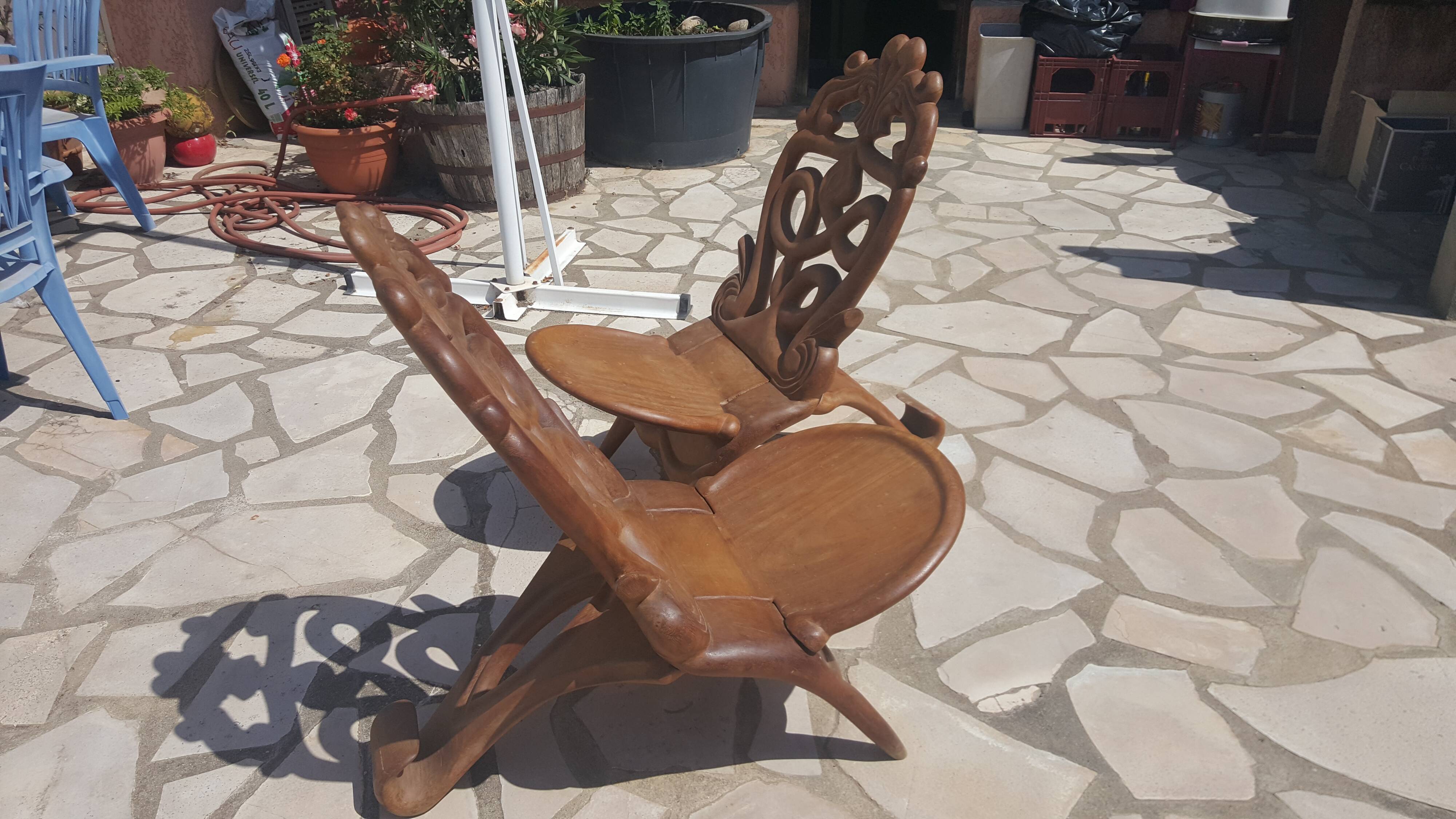 Pair of solid mahogany armchairs from Madagascar, circa 1950