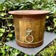 Large brass champagne bucket with baroque lion from the 19th century.