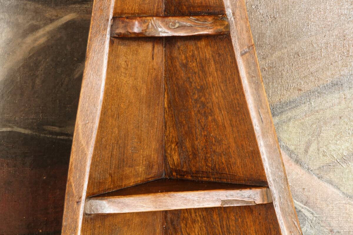 Small brutalist corner shelf in solid oak.