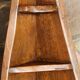 Small brutalist corner shelf in solid oak.