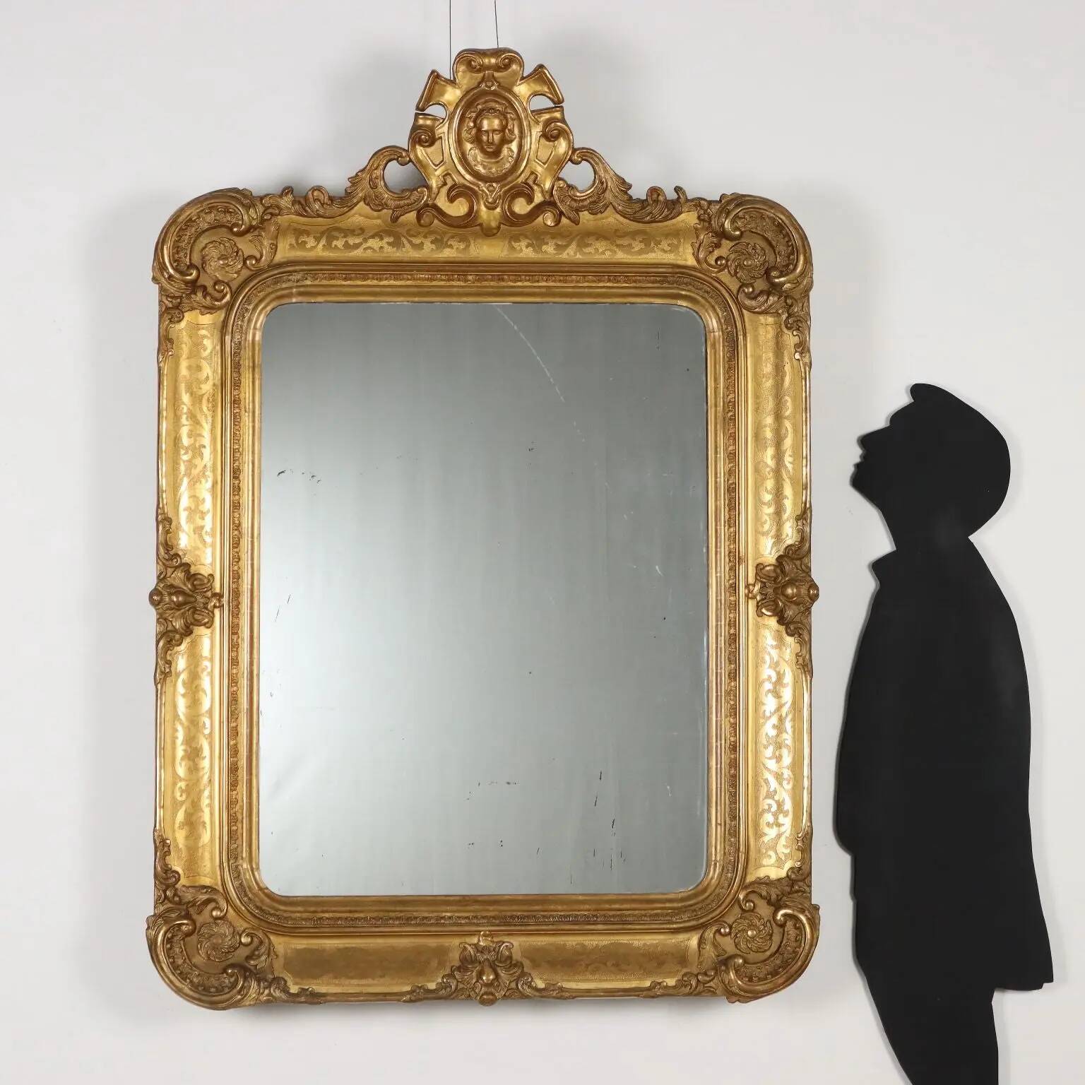 Antique mirror in carved fir, France, mid-19th century.