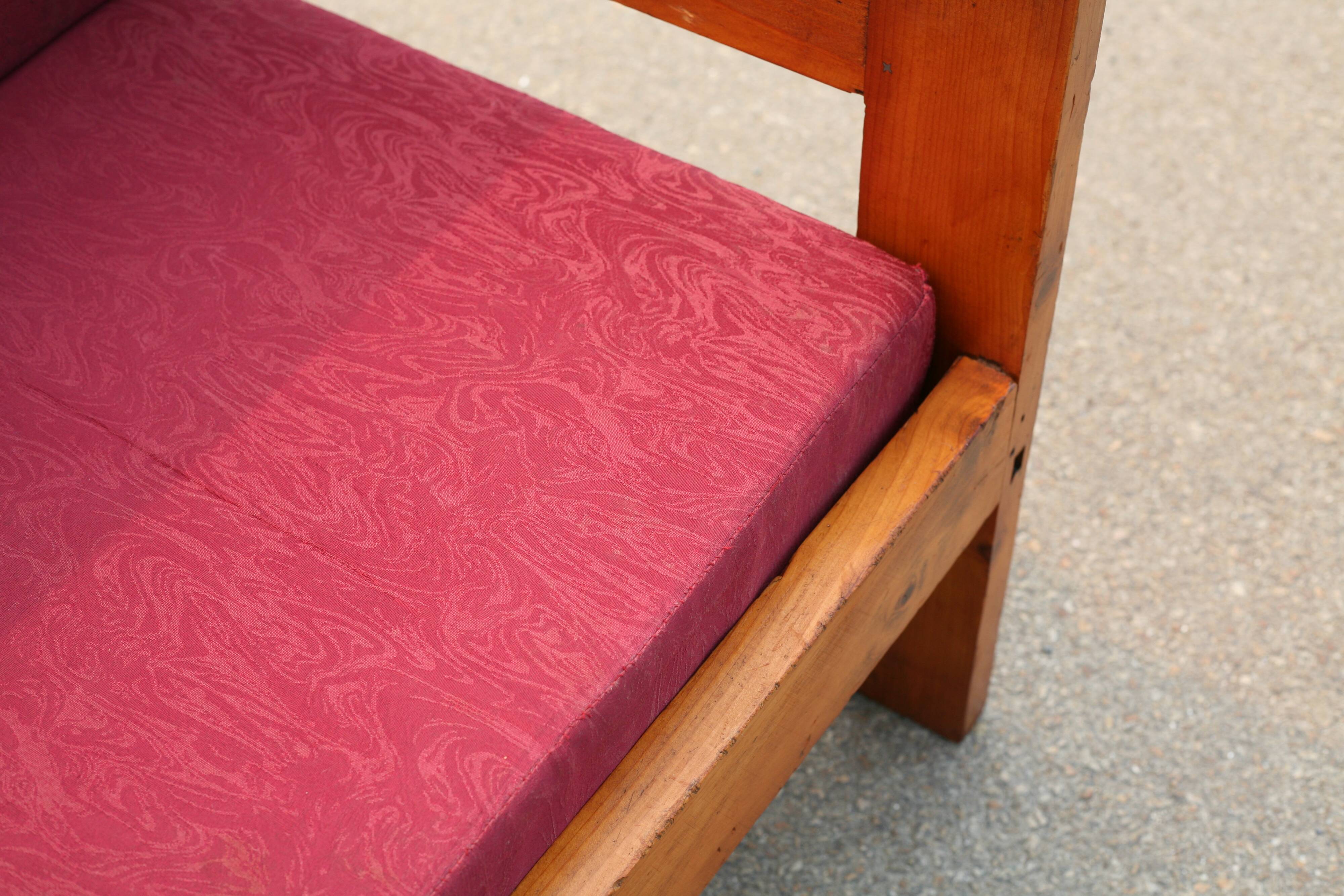 Pair of pine fireside chairs, France, 1960s, "raspberry" cushions