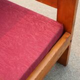 Pair of pine fireside chairs, France, 1960s, "raspberry" cushions