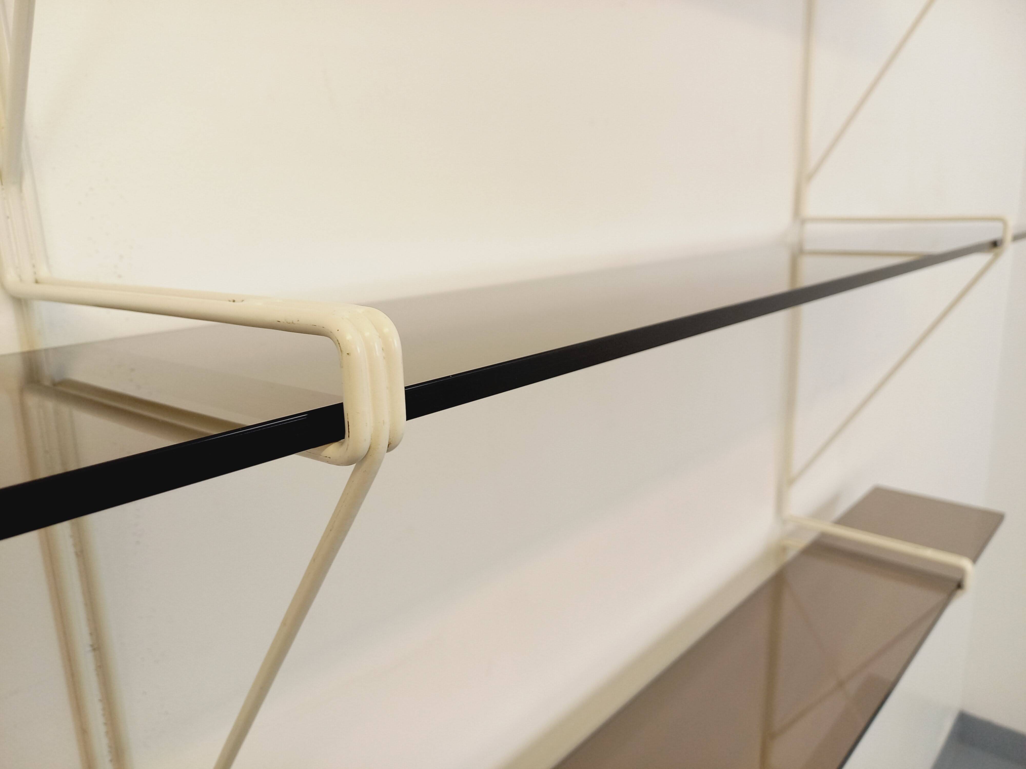 Large vintage wall shelf in smoked glass and white metal in String style.