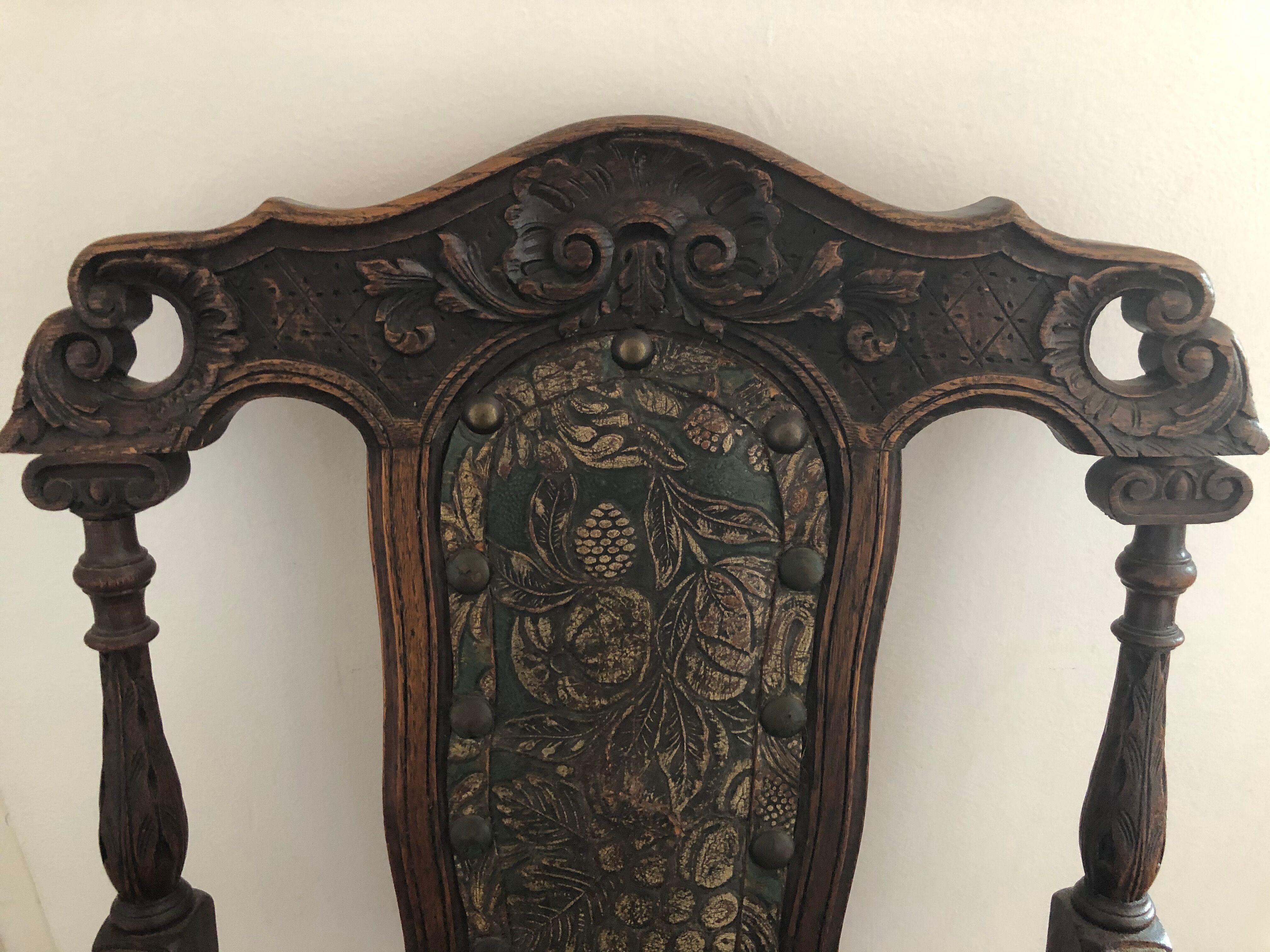 Old carved wooden armchair