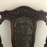 Old carved wooden armchair