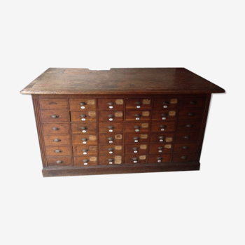 Craft furniture with small oak drawers in late 19th century