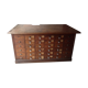 Craft furniture with small oak drawers in late 19th century