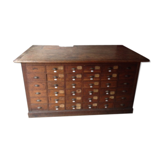 Craft furniture with small oak drawers in late 19th century