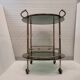 Table d'appoint / barcart / serveuse milieu de siècle, laiton doré et verre fumé, années 70 - Italie.